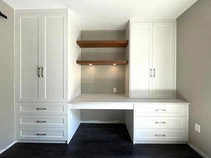 Custom white built-in storage and closets