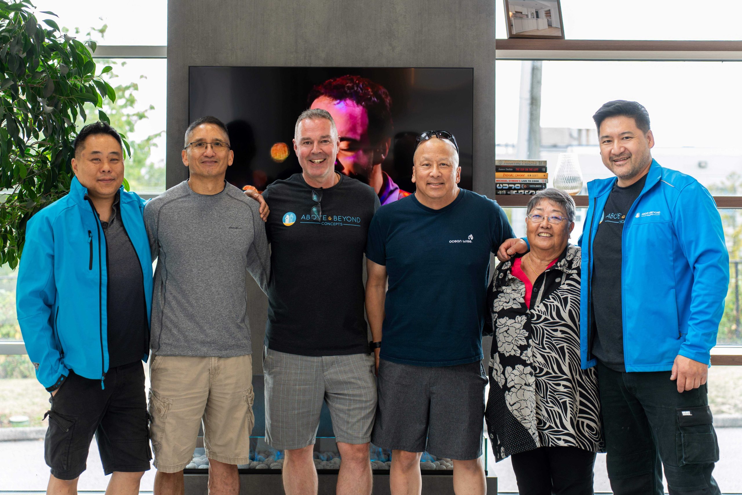 Guests gathered with the Above & Beyond Concepts team in the showroom